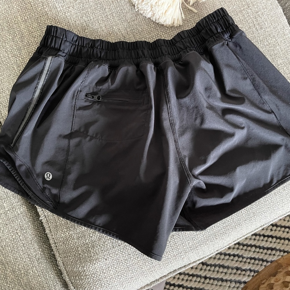 Black Lululemon shorts with back zipper pocket